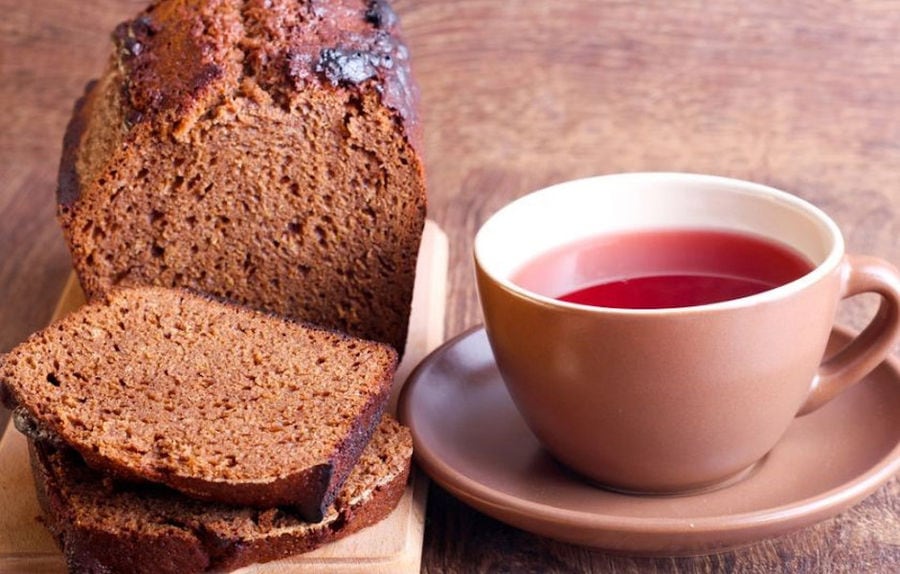 close-up of slices of chocolate cake and a cup of tea at 'M. Kosmidis'